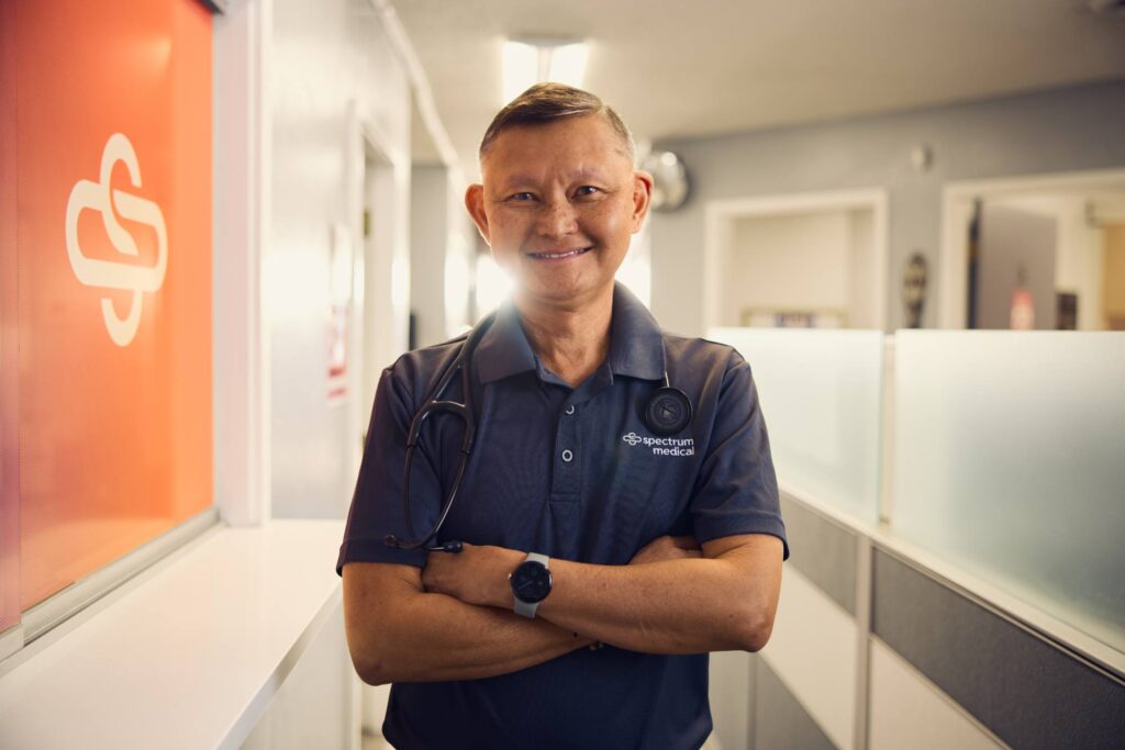 Dr. Vanig smiles warmly in the Spectrum Medical offices.