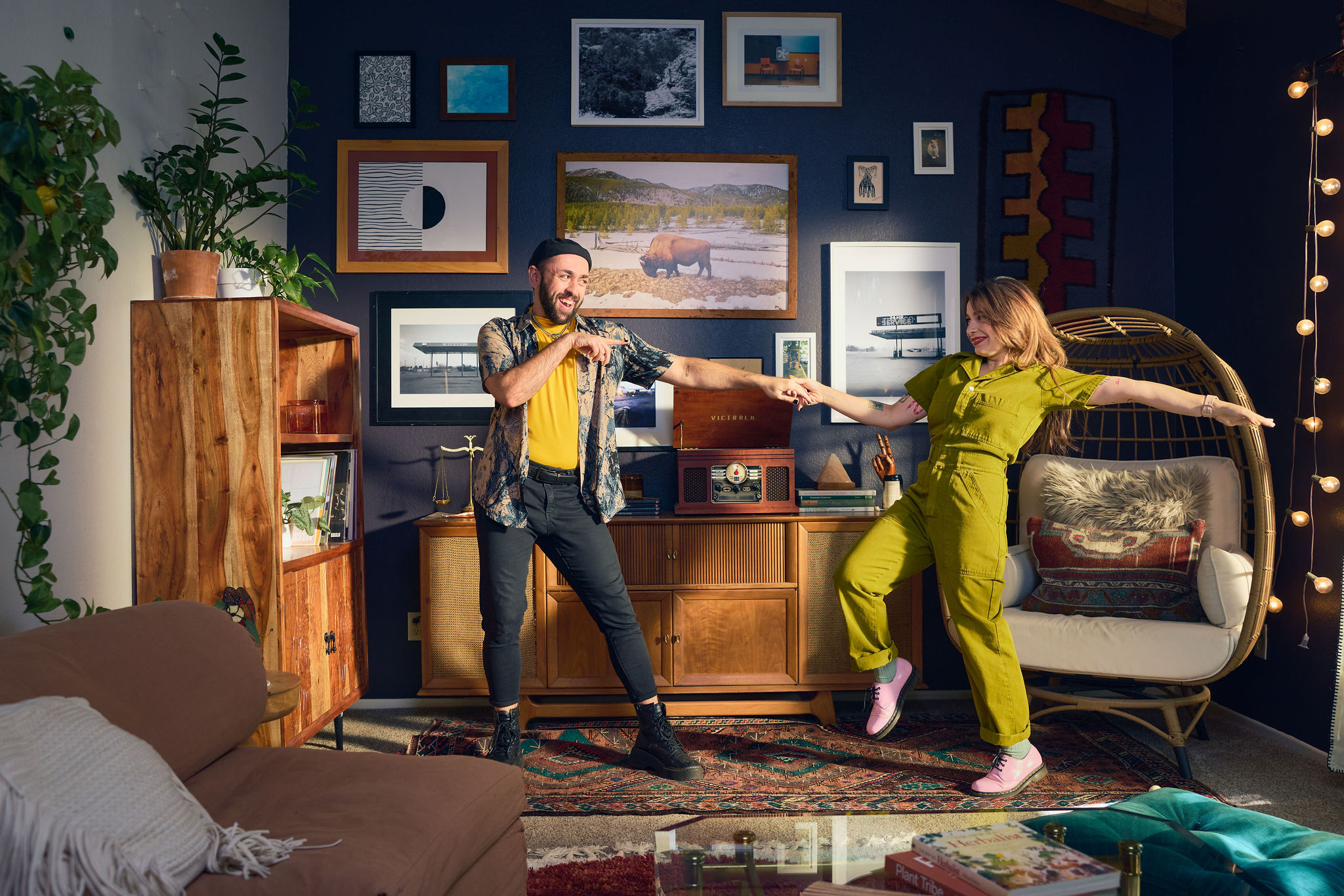 Two people dancing in their living room