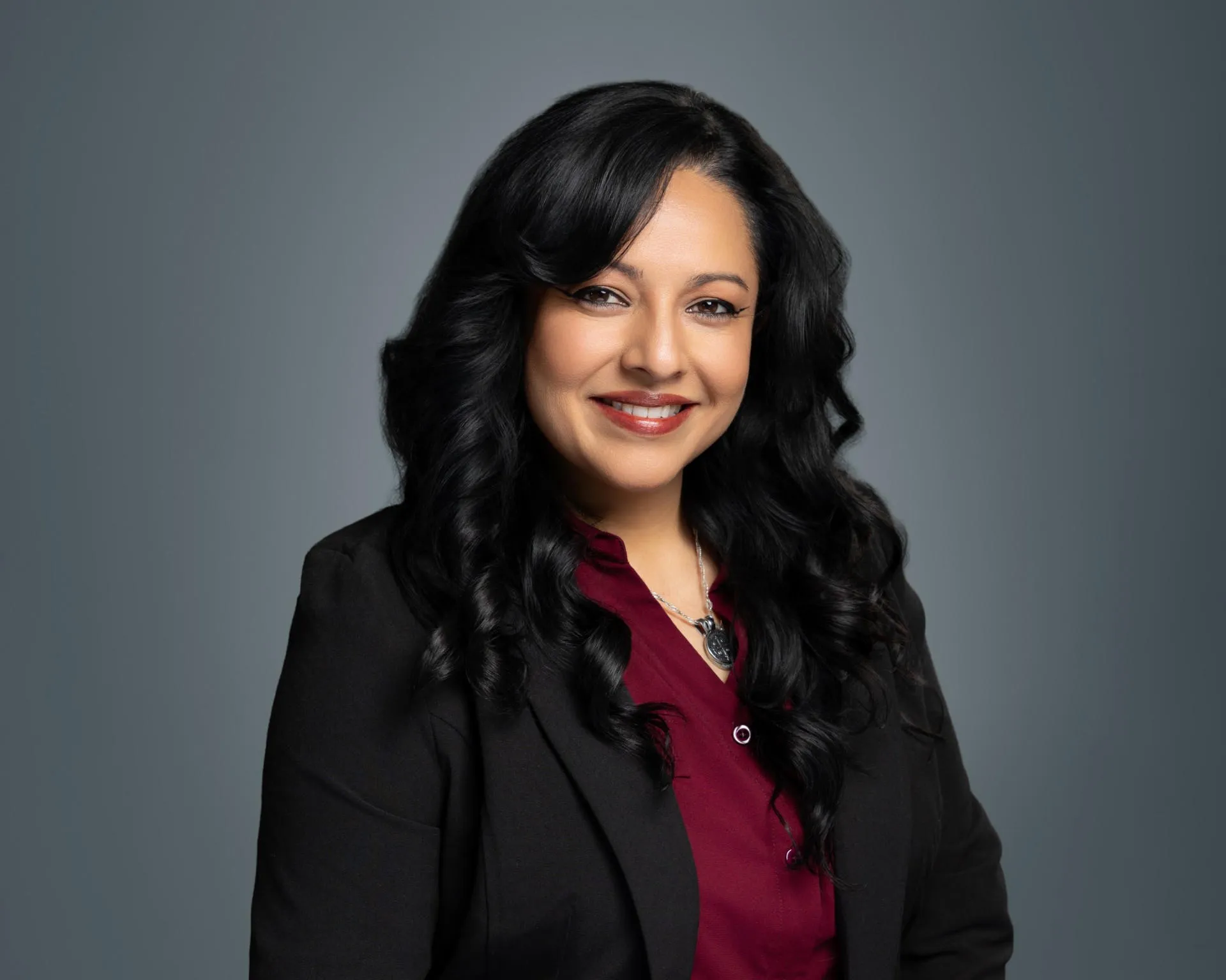 Professional picture of Delores Marks smiling warmly at the camera